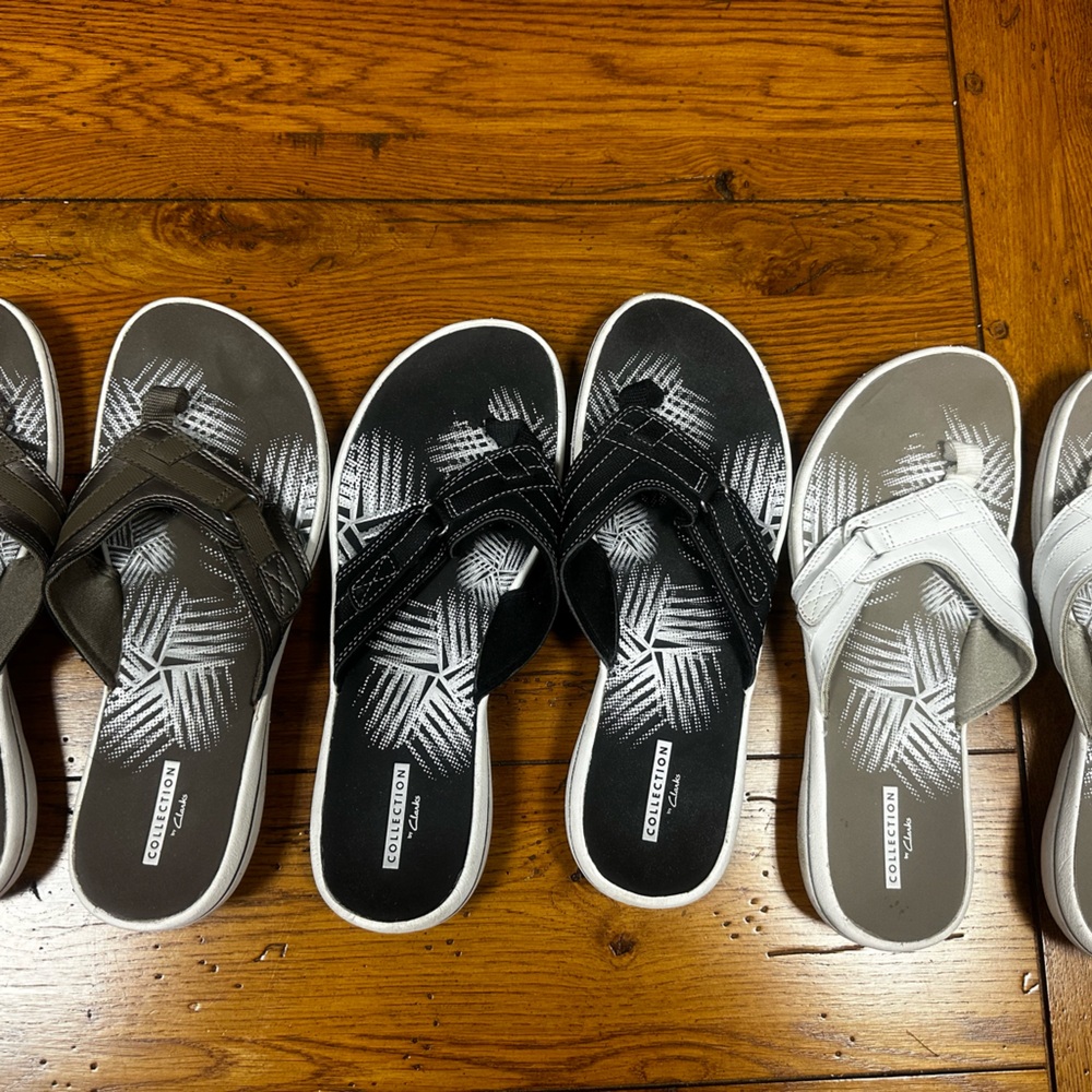 Clark’s flip flops size 9 (three pairs sold together)